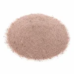 Fine pink Himalayan black salt powder pile isolated on white background