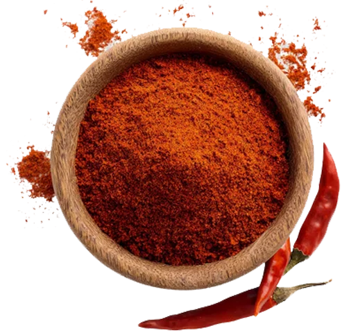 Red chili powder in a wooden bowl with whole dried red chili peppers
